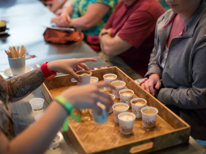 A group samples local coffee in Puerto Rico.