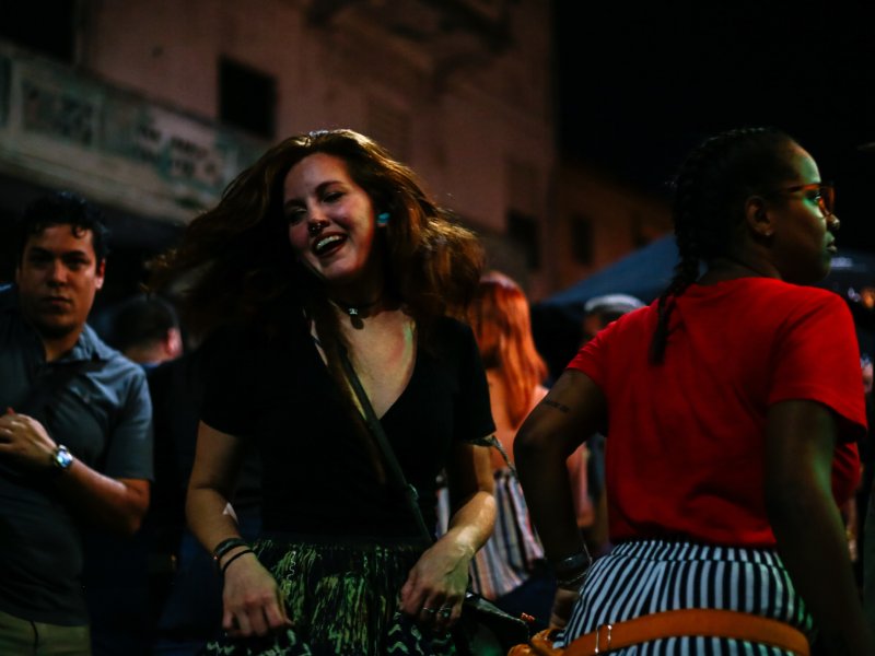 A woman dances at a nightlife spot in San Juan.