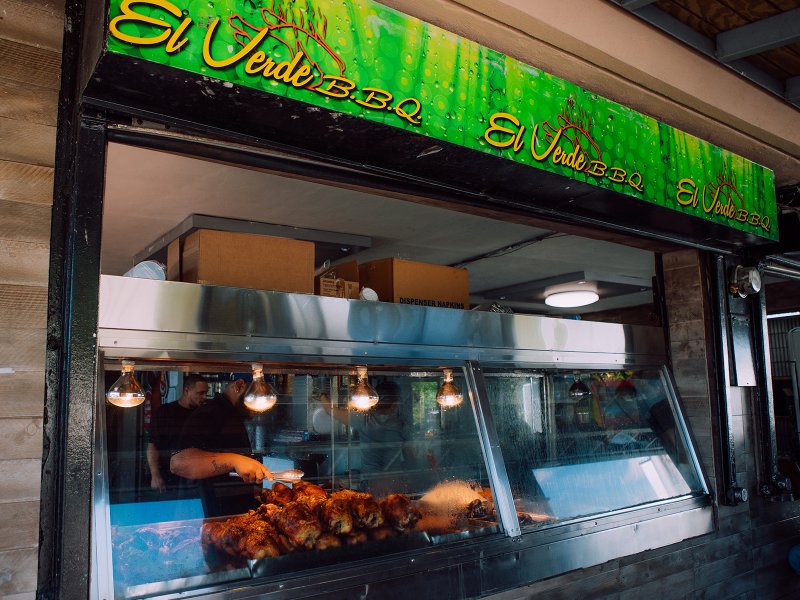 Glass display of El Verde's roasted chiken