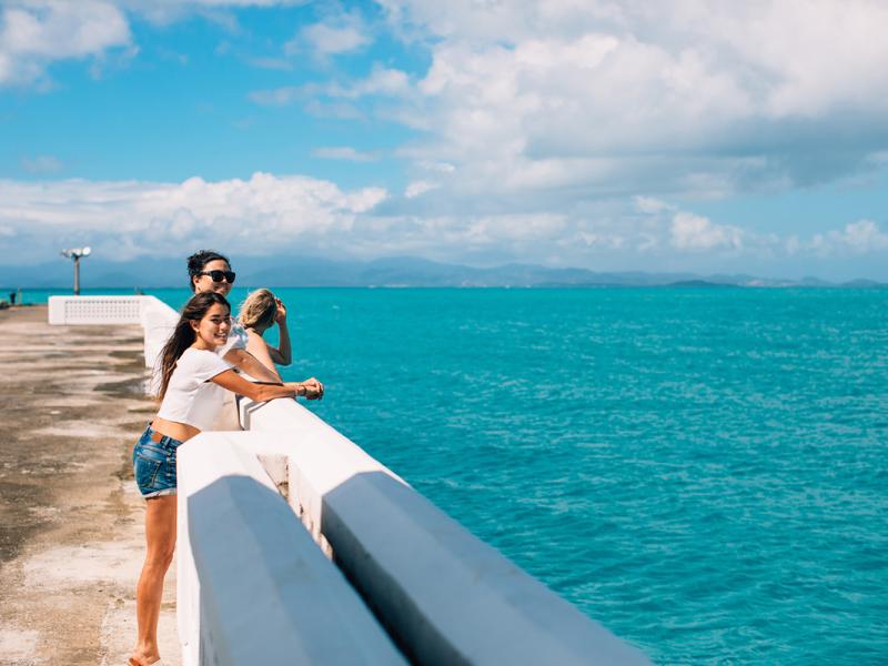 People enjoying the view of the sea at Mosquito Bay.