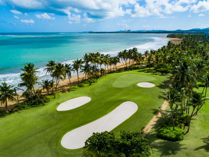 An aerial view of the oceanfront golf course at Wyndham Grand Rio Mar in Rio Grande, Puerto Rico.