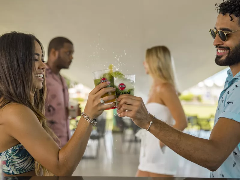 Guests enjoying handcrafted cocktails during a rum tasting experience in Puerto Rico.