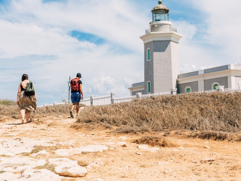 Young people visiting Cabo Rojo's lighthouse.