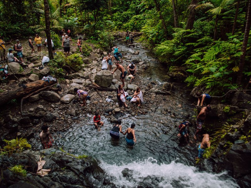 A youth group visits El Yunque and its natural pools.