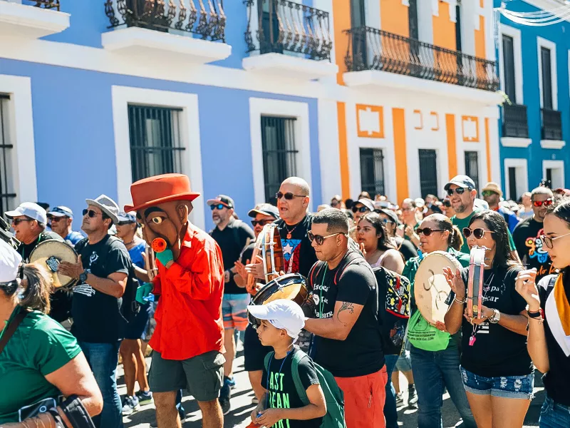 People celebrating the Fiestas de la Calle San Sebastián, one of the most vibrant Puerto Rican celebrations.