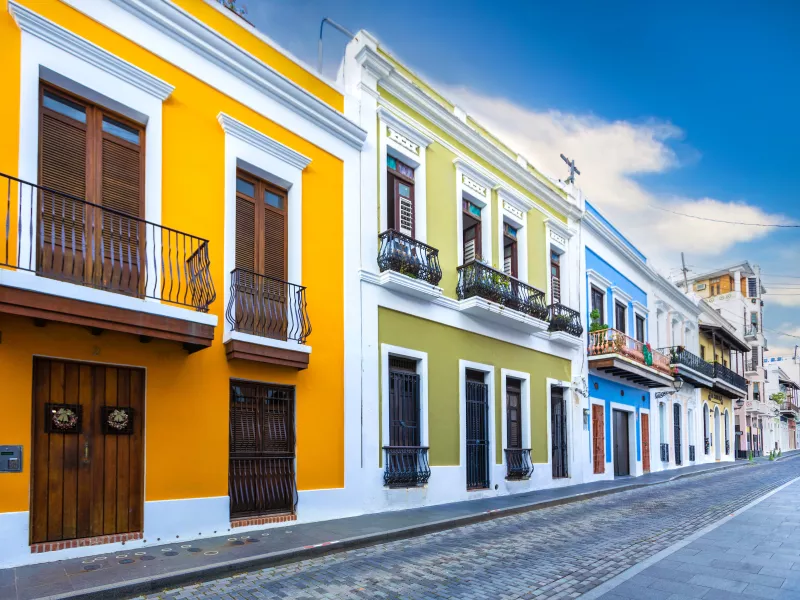 Colorful streets of Old San Juan, Puerto Rico, lined with historic colonial buildings.