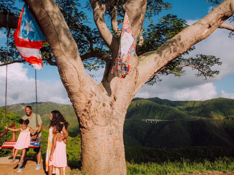 A family enjoys the swing at 