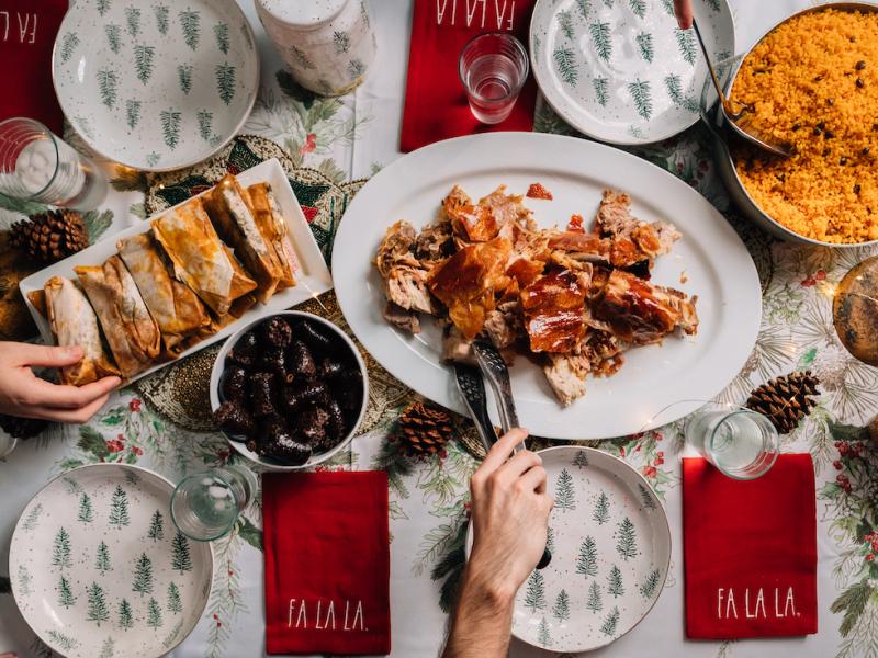 Traditional Puerto Rican Christmas dishes like pernil, arroz con gandules, pasteles, tembleque, and arroz con dulce featured on the holiday menu.