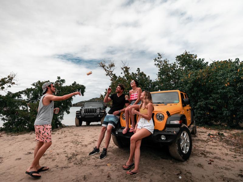 A group of friends talking during their road trip around Culebra. 