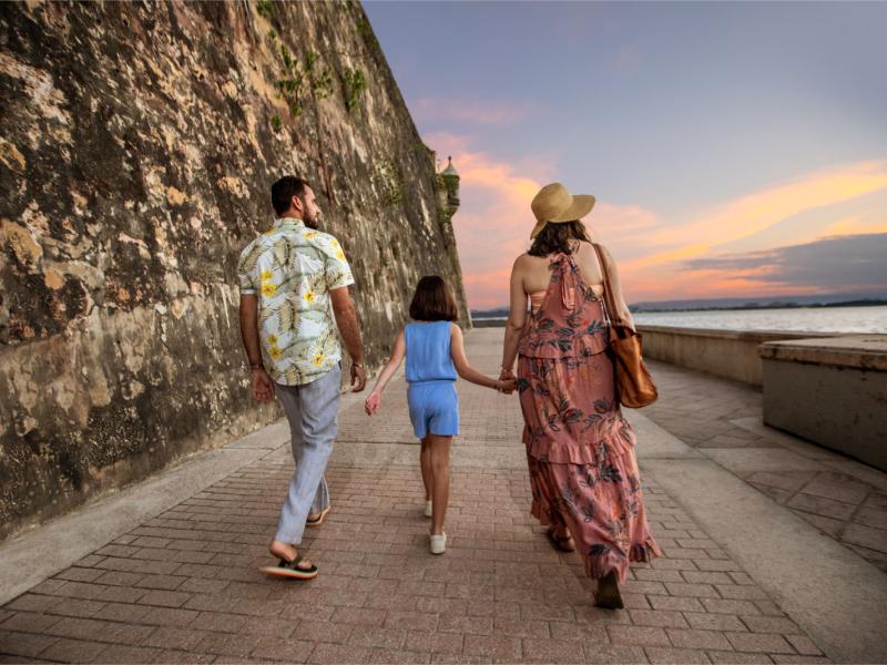 A family explores Paseo de la Princesa in San Juan, Puerto Rico