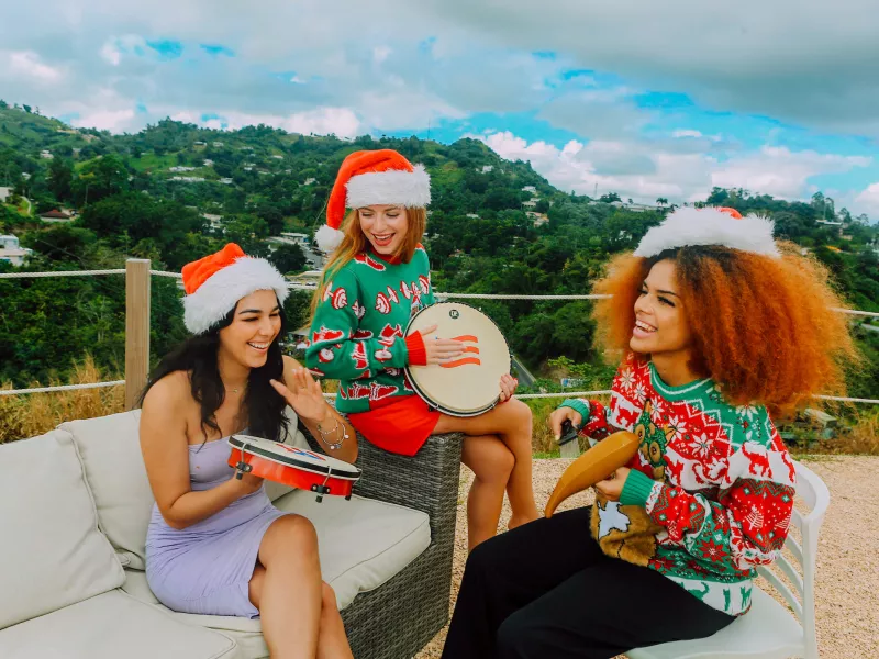 Three women celebrating Christmas in Puerto Rico.