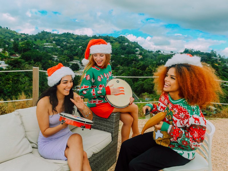 Three women celebrating Christmas in Puerto Rico.