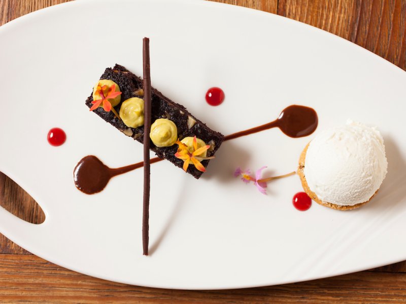 A chocolate-based dessert highlights different shapes and textures.