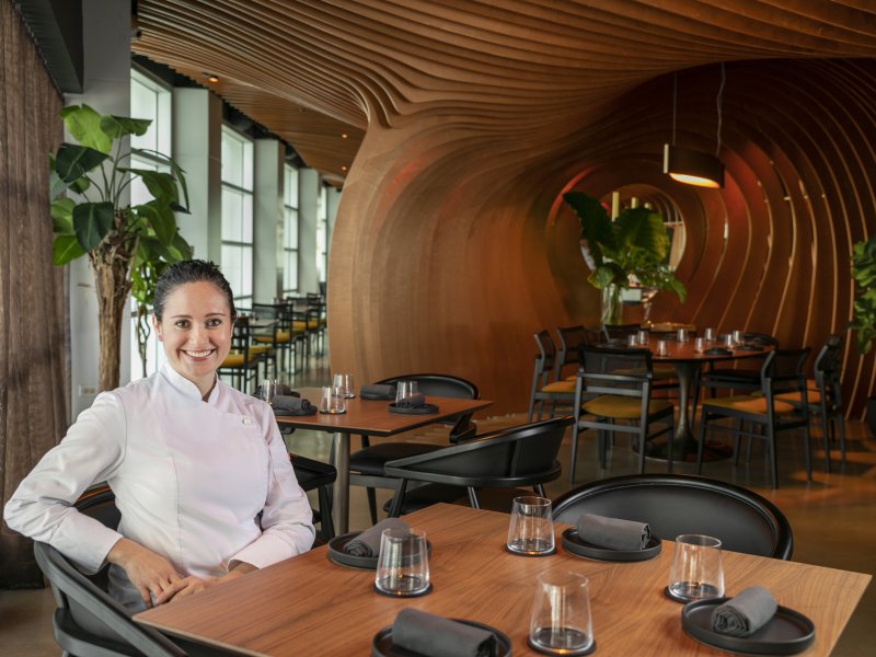 Chef Carol Reyes in Boveda dinning area.