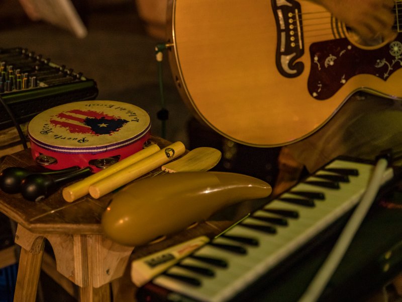 A collection of traditional Puerto Rican percussion instruments.