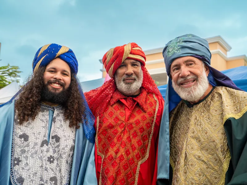 Three men dressed as the Three Wise Men smile during the Fiesta de los Reyes Magos celebration in Puerto Rico.