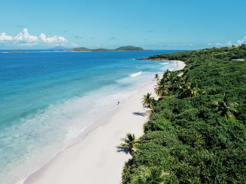 Beautiful beach in Puerto Rico with turquoise Caribbean waters and sandy shoreline.