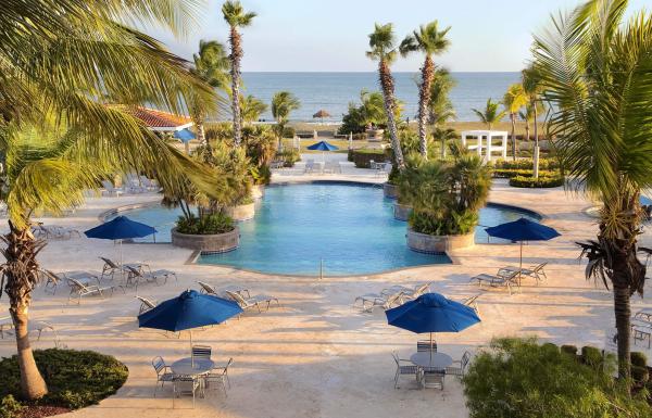 Relaxing poolside at the Hilton Ponce Golf & Casino Resort. 