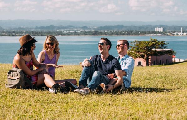 Couples enjoy the warm Puerto Rican day in a park