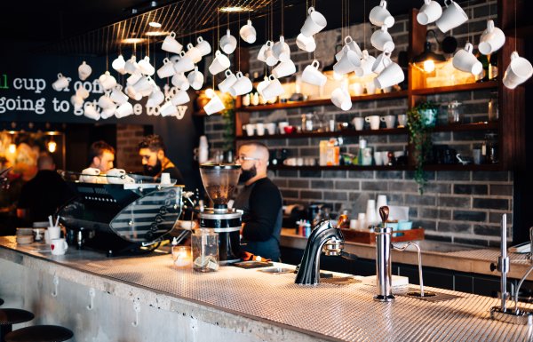 Decorative coffee cups hang from the ceiling at Bistro Cafe in Carolina.