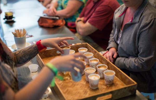 A group samples local coffee in Puerto Rico.