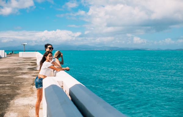 People enjoying the view of the sea at Mosquito Bay.