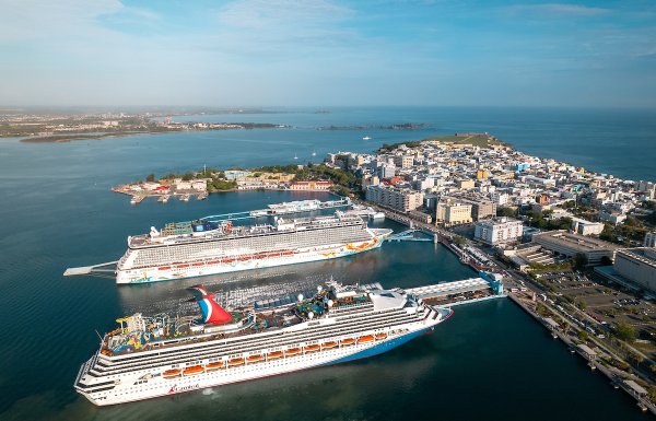 An aerial view of two cruise ships in-port at the Old San Juan Port in Puerto Rico.