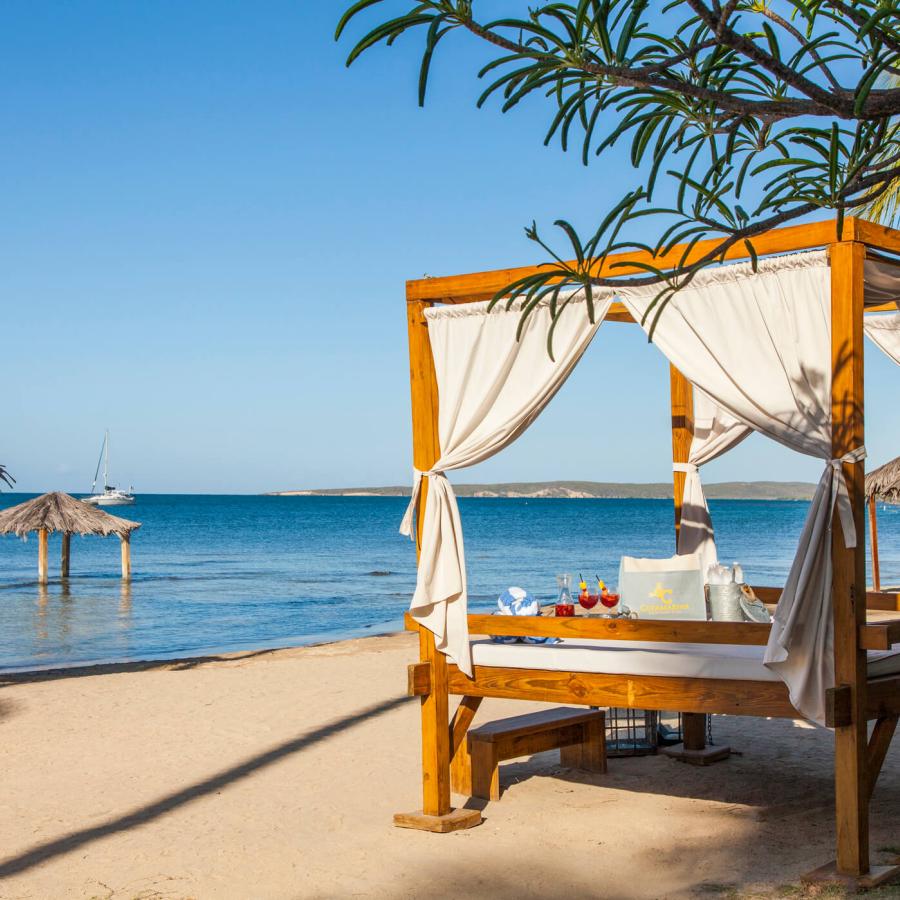 Relaxing beachside bed at the Copamarina Beach Resort.