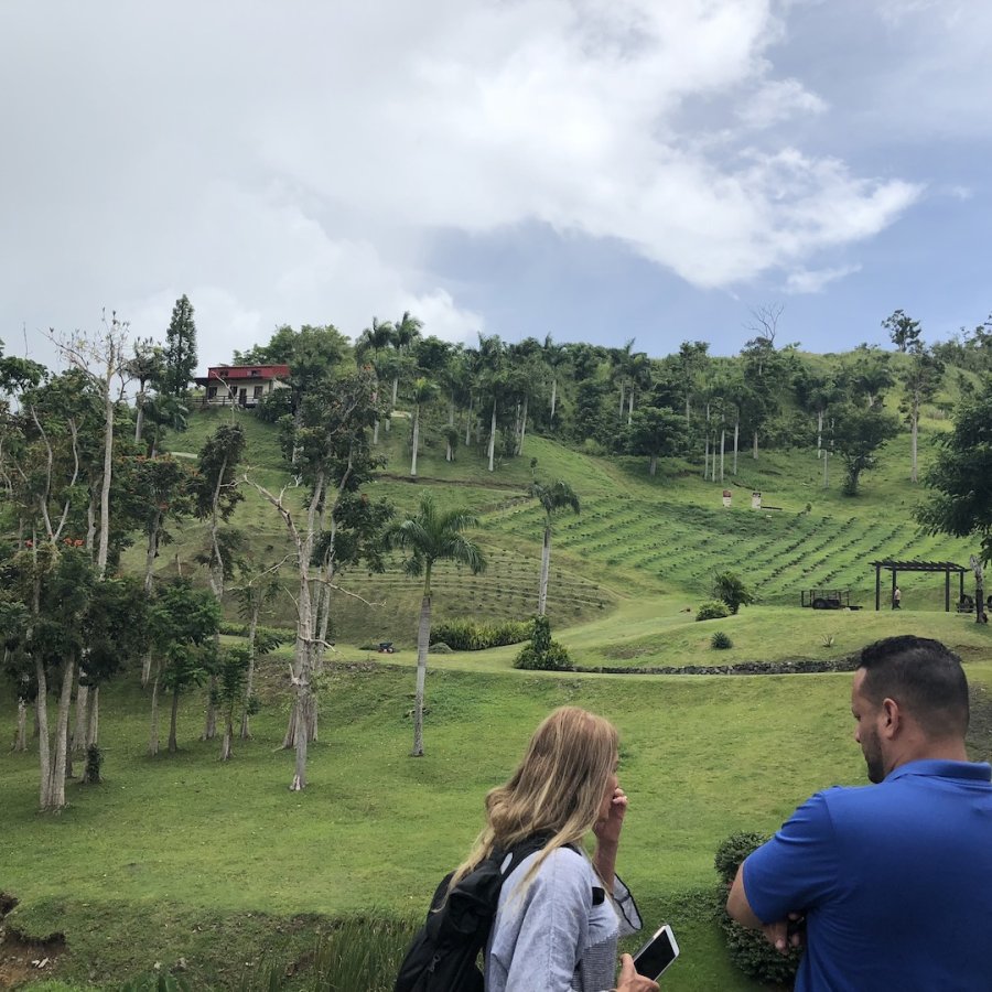 Visitors overlook the fertile fields at Hacienda Muñoz.