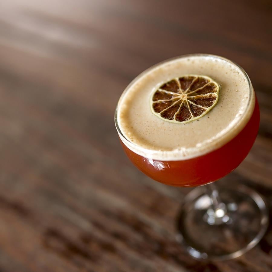 An expertly crafted cocktail from La Factoria.