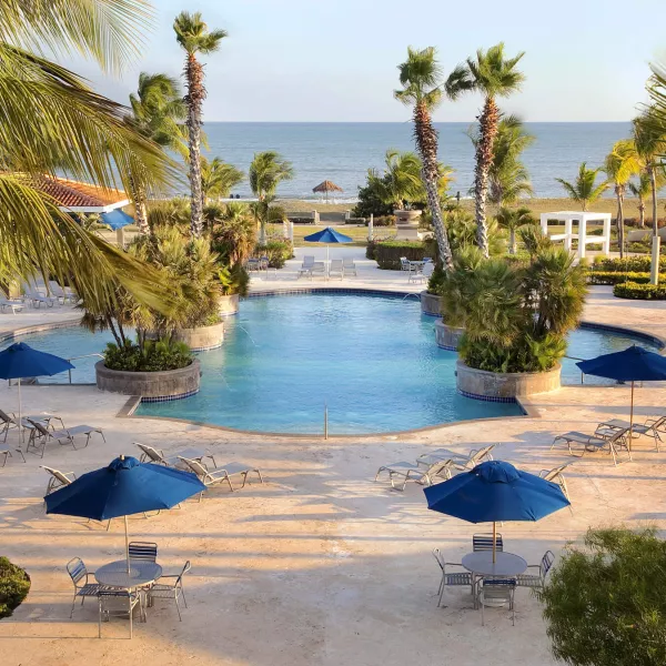 Relaxing poolside at the Hilton Ponce Golf & Casino Resort. 