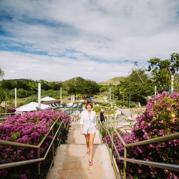 A woman walking along the Hot Springs in  Coamo.