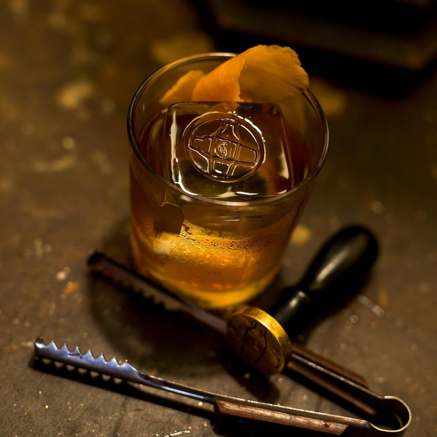 A spiced Old Fashioned cocktail at La Factoria in San Juan.