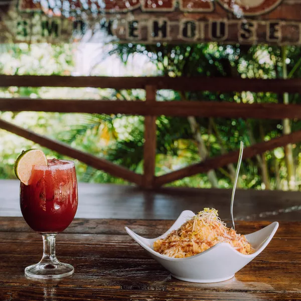 A glass of sangria and creole cuisine at ASAO smokehouse in Ciales
