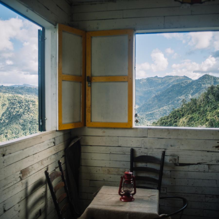 Mountain views outside the windows at Casa Vieja Restaurant in Ciales.