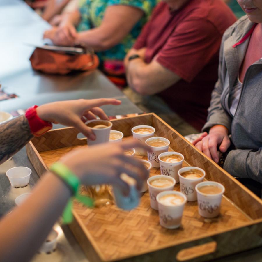 A group samples local coffee in Puerto Rico.