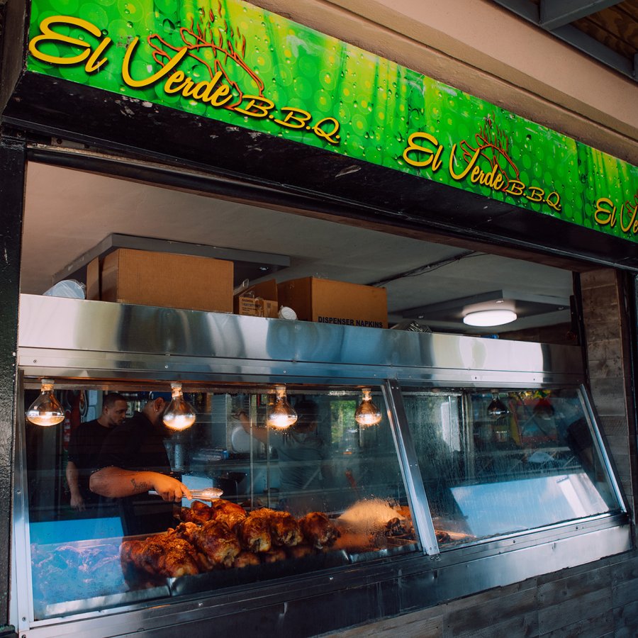 Glass display of El Verde's roasted chiken