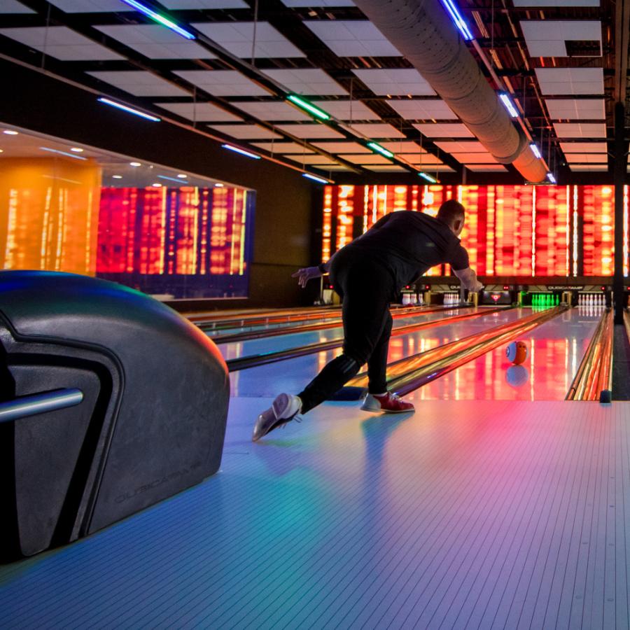 A person bowls at the Route 66 Mall bowling alley.
