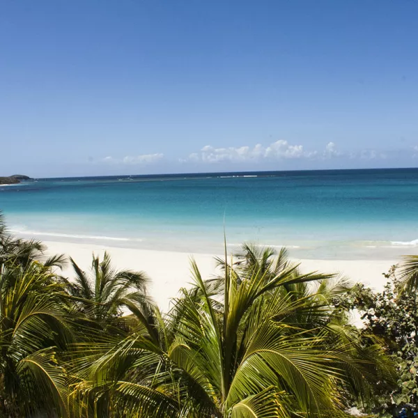 Panoramic view of Flamenco Beach in Culebra, Puerto Rico, known for its white sands and crystal-clear waters.