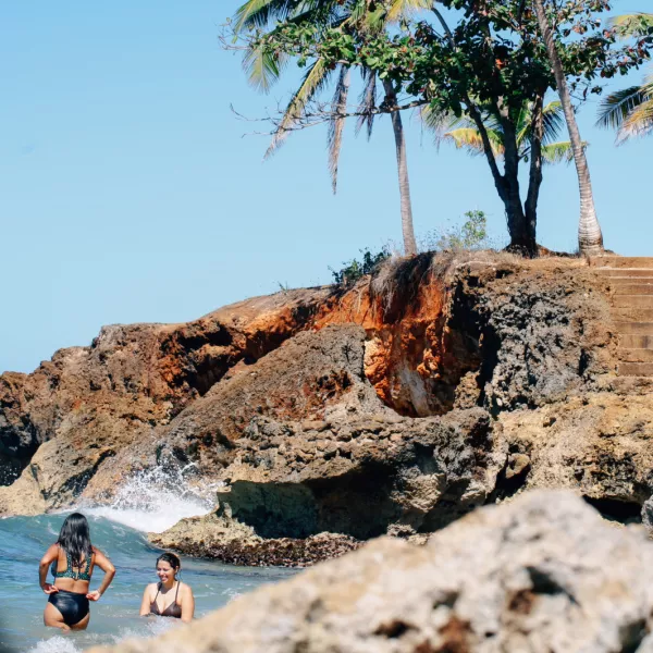 Swimmers at Wishing Well Beach in Aguadilla, Puerto Rico.
