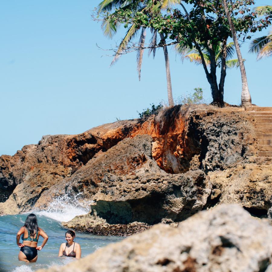 Swimmers at Wishing Well Beach in Aguadilla, Puerto Rico.