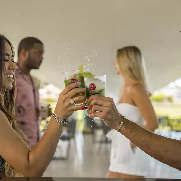 Guests enjoying handcrafted cocktails during a rum tasting experience in Puerto Rico.
