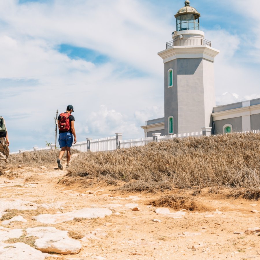 Young people visiting Cabo Rojo's lighthouse.