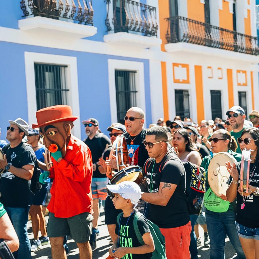 People celebrating the Fiestas de la Calle San Sebastián, one of the most vibrant Puerto Rican celebrations.