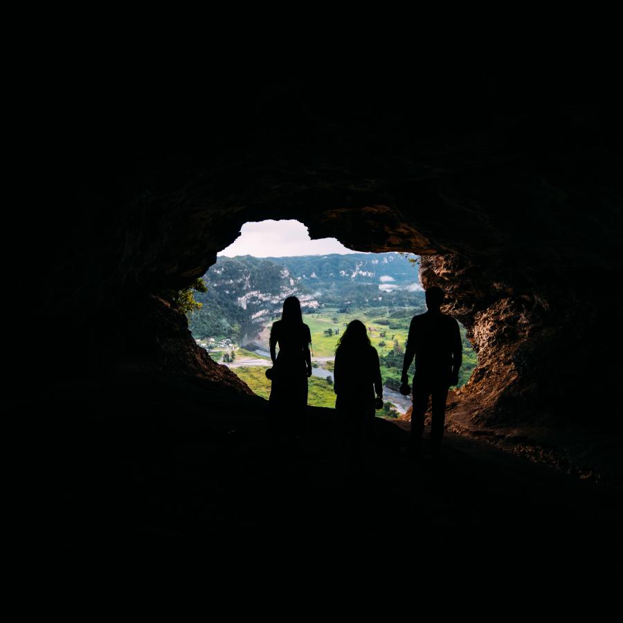 People look out the cave known as Cueva Ventana