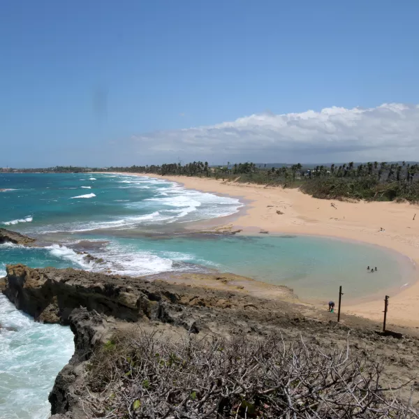 Relaxing waves at La Poza del Obispo, a safe beach in Arecibo, Puerto Rico.