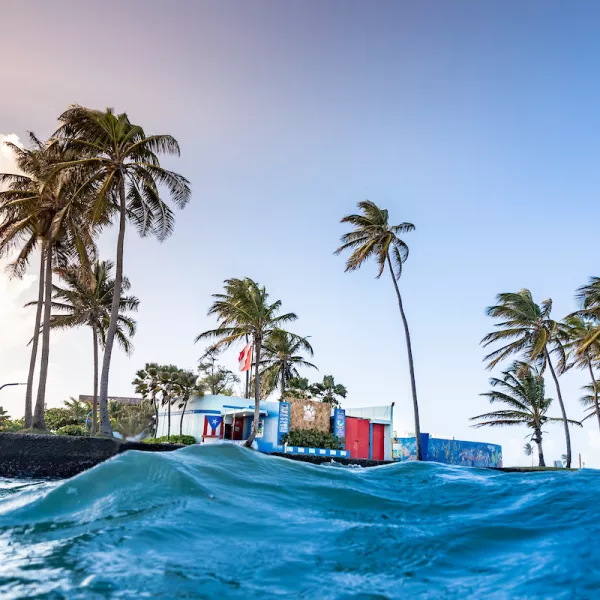 Calm waters at El Escambron beach, a popular location for snorkeling in Puerto Rico.