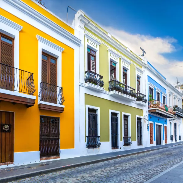 Colorful streets of Old San Juan, Puerto Rico, lined with historic colonial buildings.