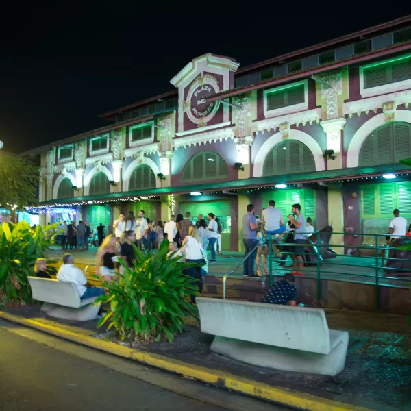 La Placita in San Juan at dusk, filled with people and vibrant energy