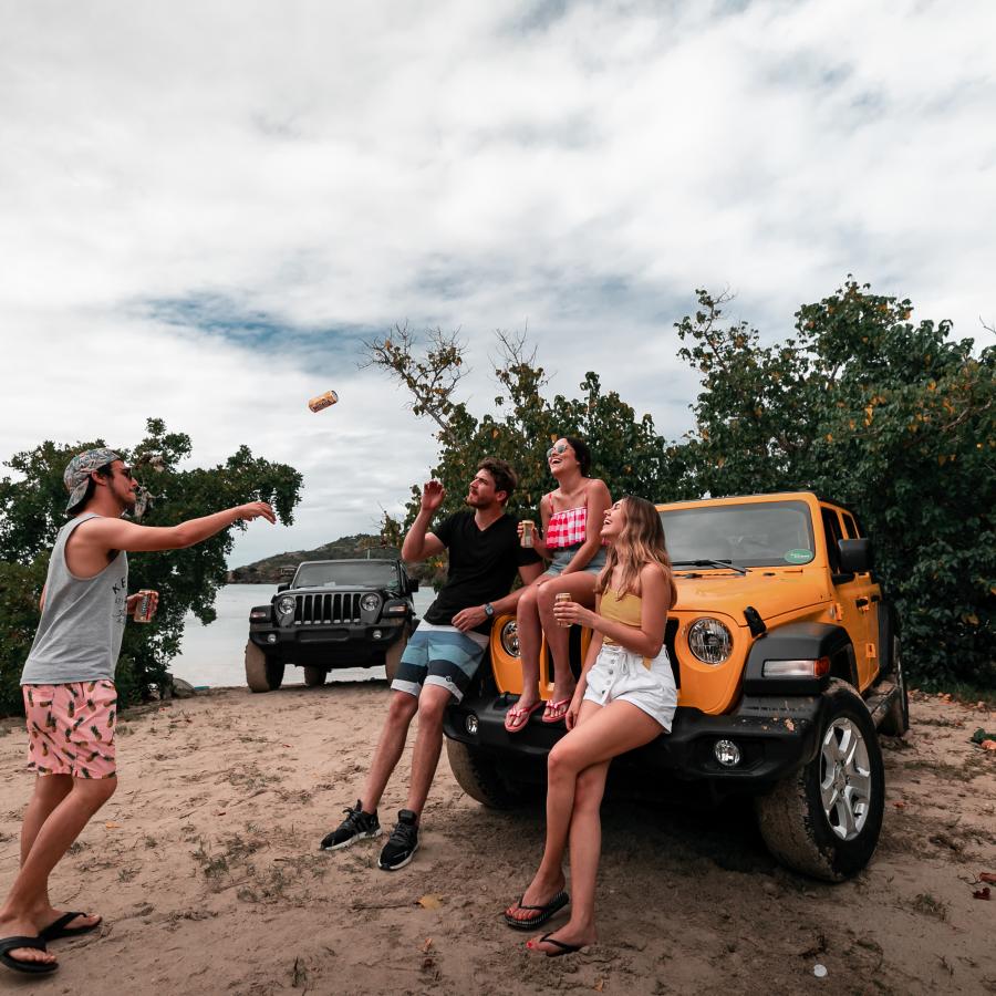 Four friends playing around near the beach in Culebra. 